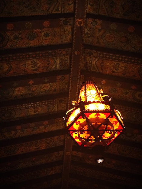 Low angle view of illuminated lantern hanging from ceiling at california theatre