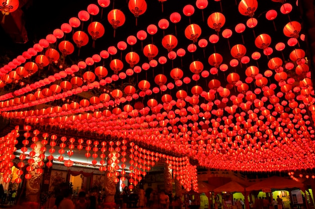 low angle view of illuminated lanterns hanging at night