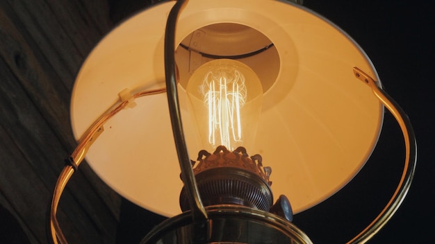Photo low angle view of illuminated light bulb