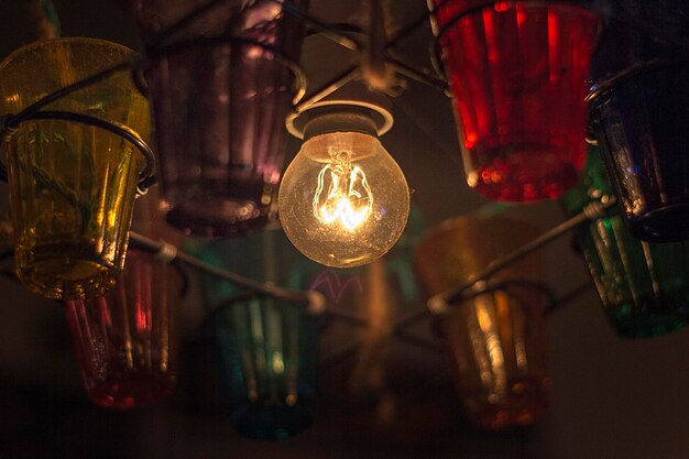 Photo low angle view of illuminated light bulb