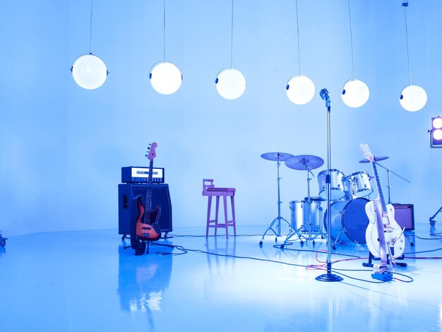 Low angle view of illuminated lights against blue sky