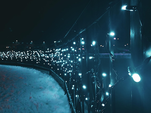 Photo low angle view of illuminated lights at night