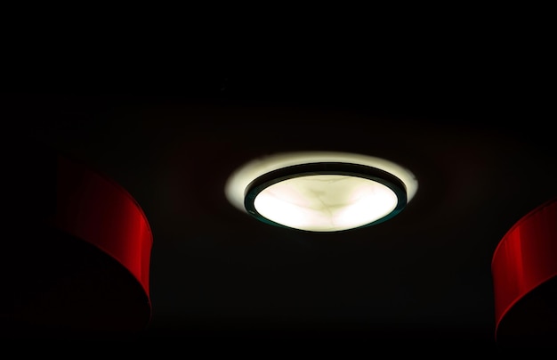 Photo low angle view of illuminated pendant lights