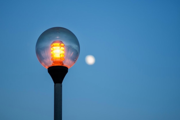 low angle view of illuminated street light against clear sky