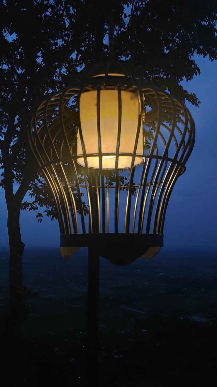Photo low angle view of illuminated street light against sky