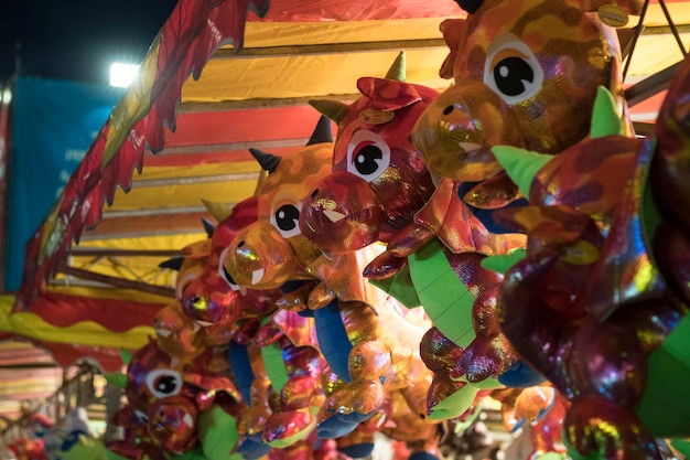 Photo low angle view of inflatable toys at amusement park