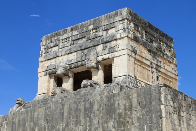 Low angle view of kukulkan pyramid at chichen itza against sky