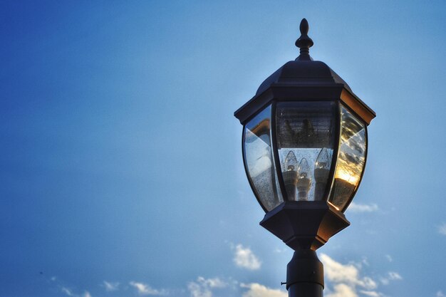 Low angle view of lamp post against clear sky