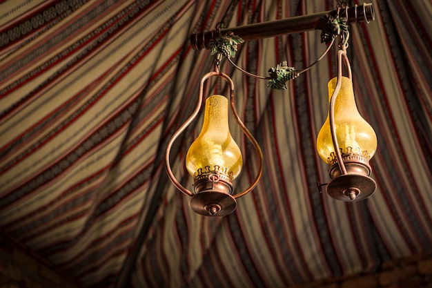 Photo low angle view of lanterns hanging in tent