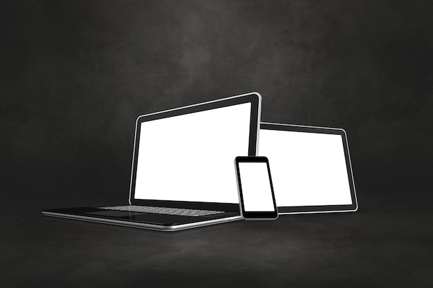 Low angle view of laptop on table against black background