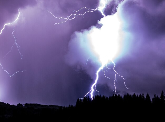 Low angle view of lightning in sky at night