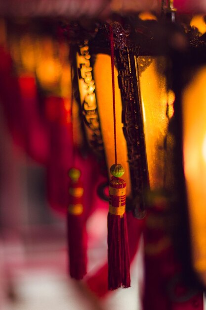 Photo low angle view of lit candles in lantern