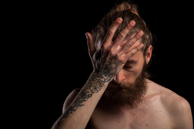 Low angle view of man against black background