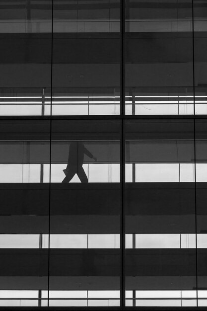 Low angle view of man walking in building