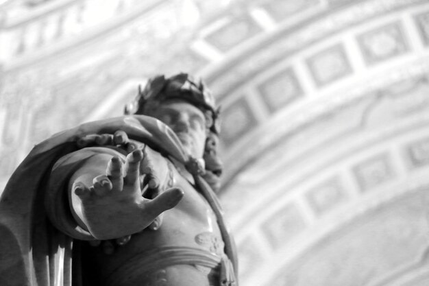 Low angle view of man wearing mask