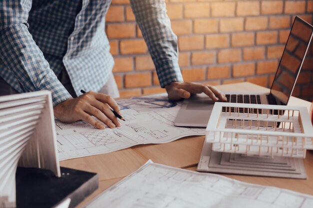 Low angle view of man working on table