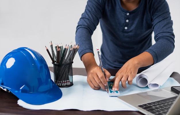 Low angle view of man working on table