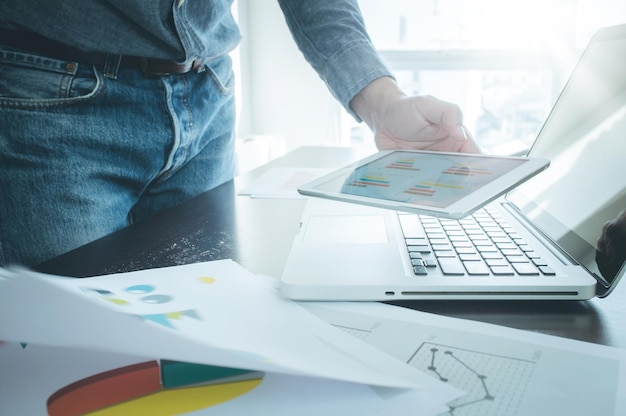 Low angle view of man working on table