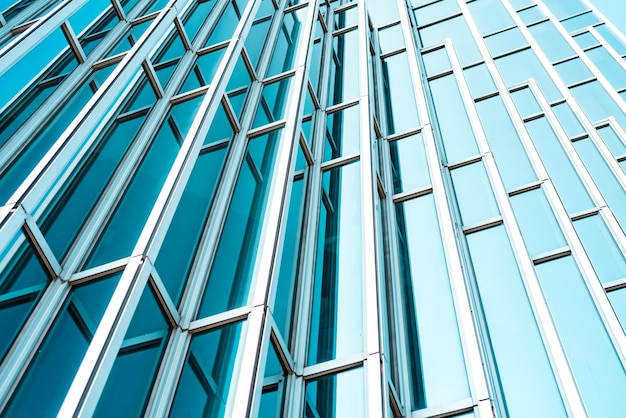 Low angle view of modern building against blue sky