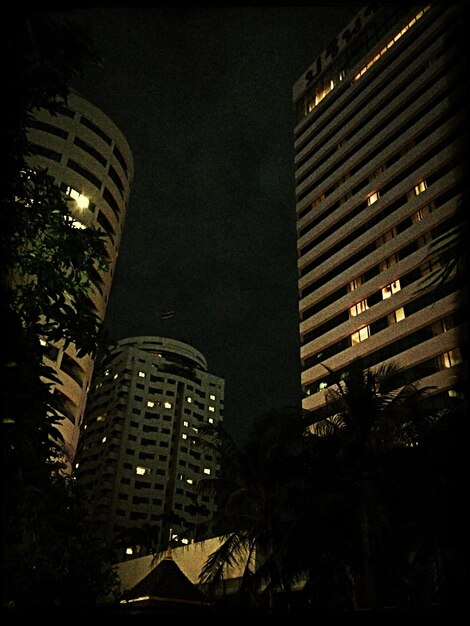 Low angle view of modern building at night