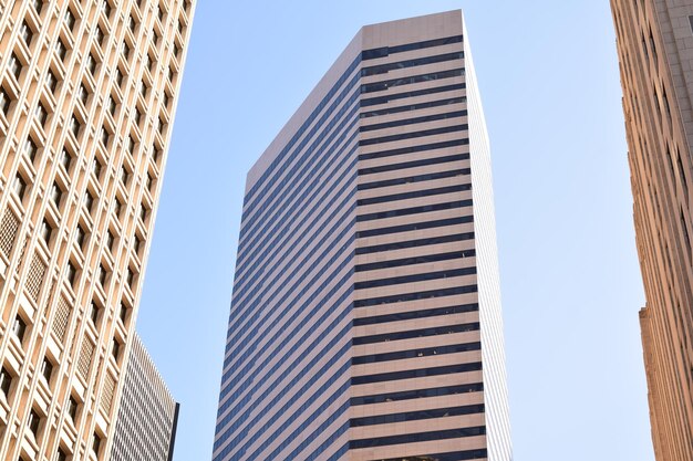 Photo low angle view of modern buildings against clear sky