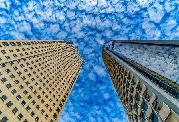 Low angle view of modern buildings against sky