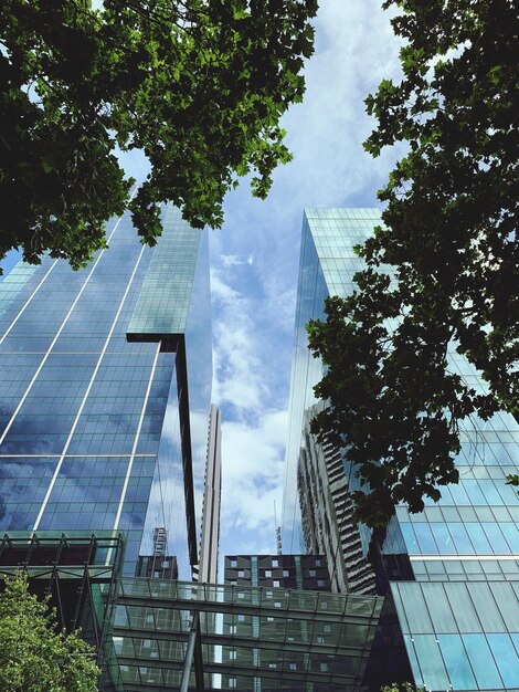 Low angle view of modern buildings against sky