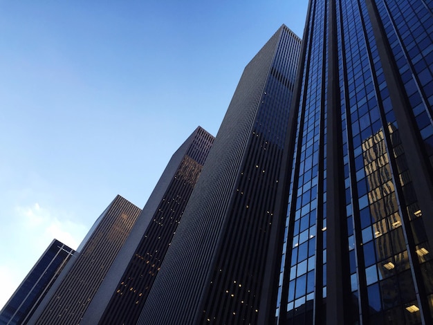 Low angle view of modern buildings against sky