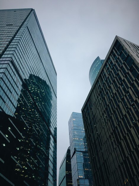 Low angle view of modern buildings against sky