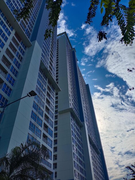 Low angle view of modern buildings against sky