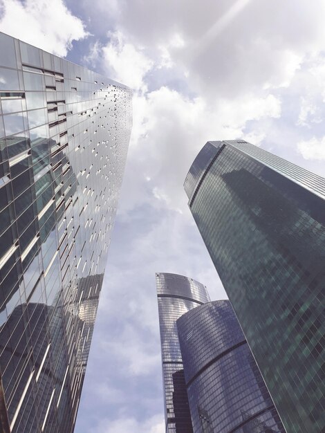 Low angle view of modern buildings against sky