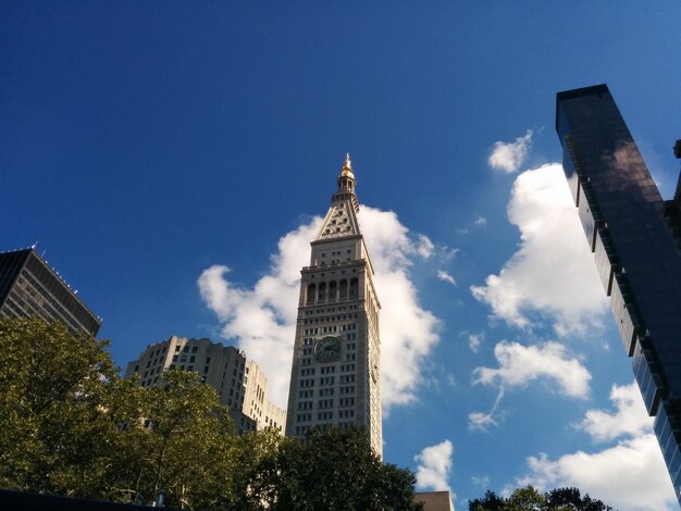 Low angle view of modern buildings in city against sky