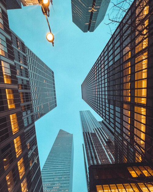 Photo low angle view of modern buildings in city