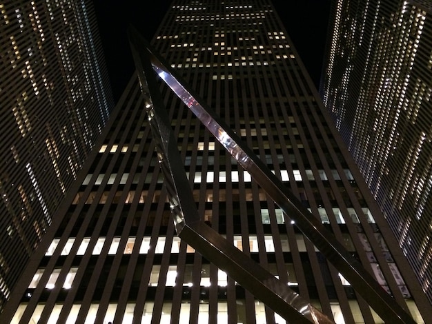 Photo low angle view of modern buildings at night