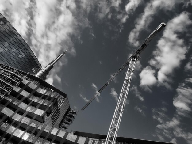 Low angle view of modern skyscraper against sky