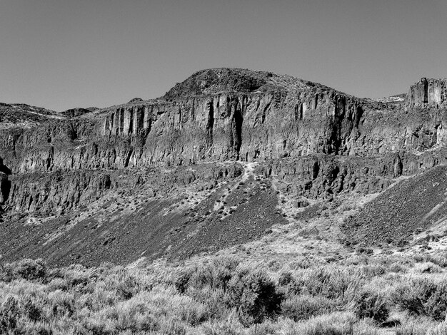 Low angle view of mountain against clear sky