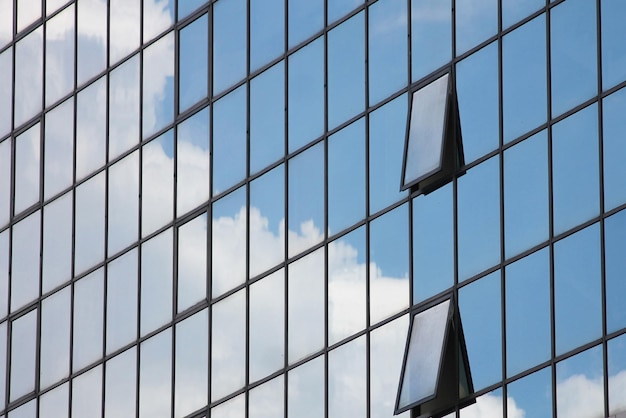 low angle view of office building against sky