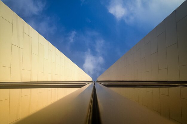 Low angle view of office building against sky