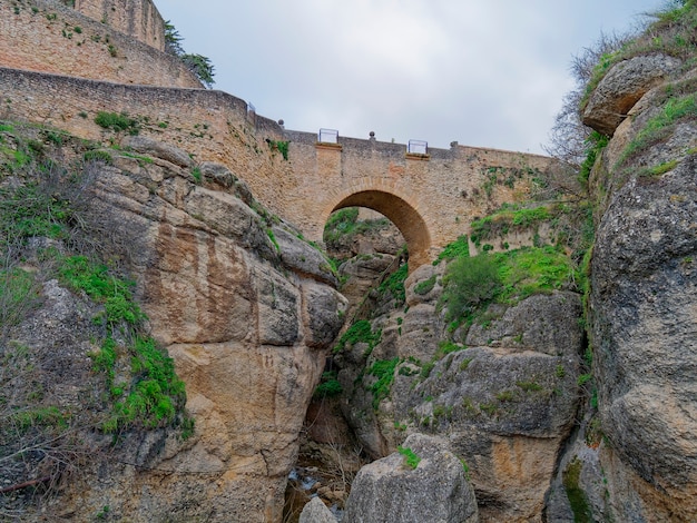 Low angle view of Old Bridge of Ronda, Spain.