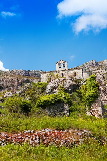 Low angle view of old building against blue sky