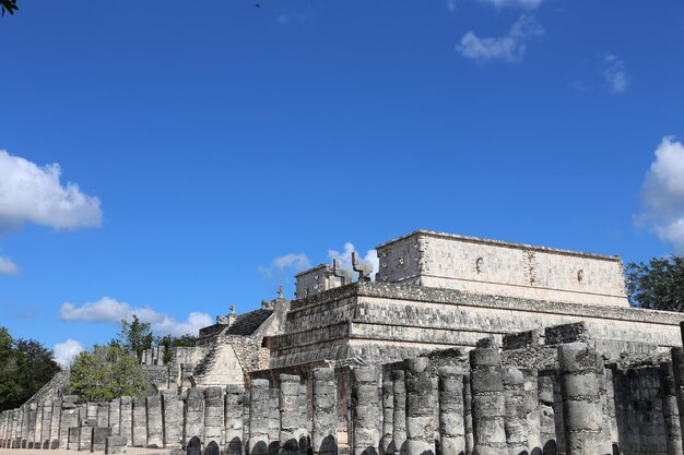 Low angle view of old building against blue sky