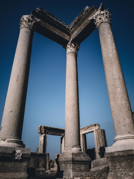 Low angle view of old ruin building against sky