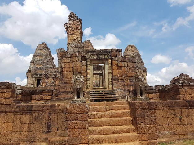 Low angle view of old ruins against sky