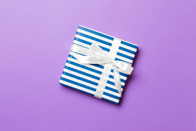 Low angle view of open box against blue background