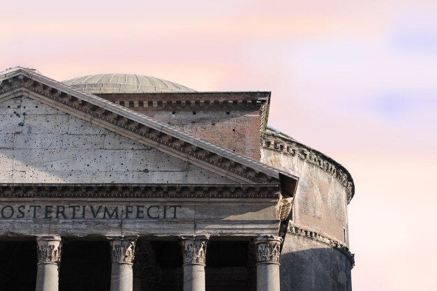 Photo low angle view of pantheon momument against pink sky in rome