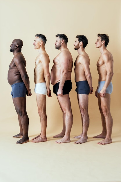 Photo low angle view of people standing against white background