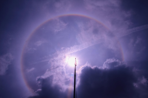 Photo low angle view of rainbow against sky at night