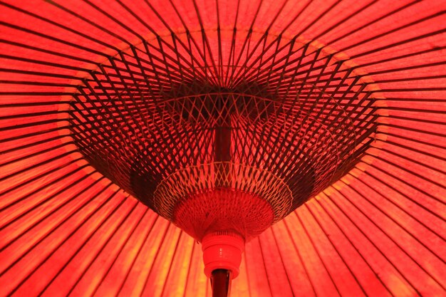 Low angle view of red umbrella