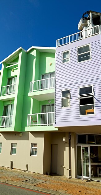 Low angle view of residential building against blue sky