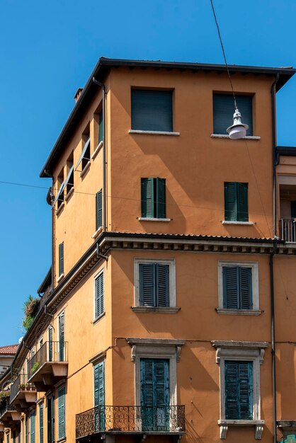 Low angle view of residential buildings against blue sky